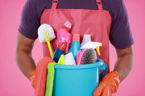 Docklands house cleaning service sanitising a bright kitchen and countertops