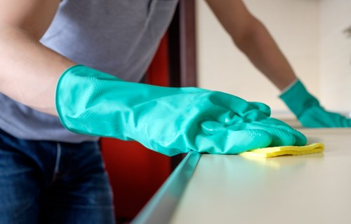Professional cleaning team working in a Docklands office